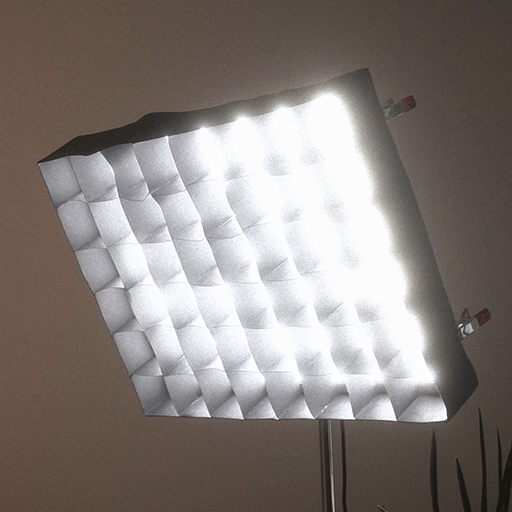 A filmmaking light with a grid
